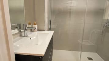 Apartamento conforto, vista para a cidade | Banheiro