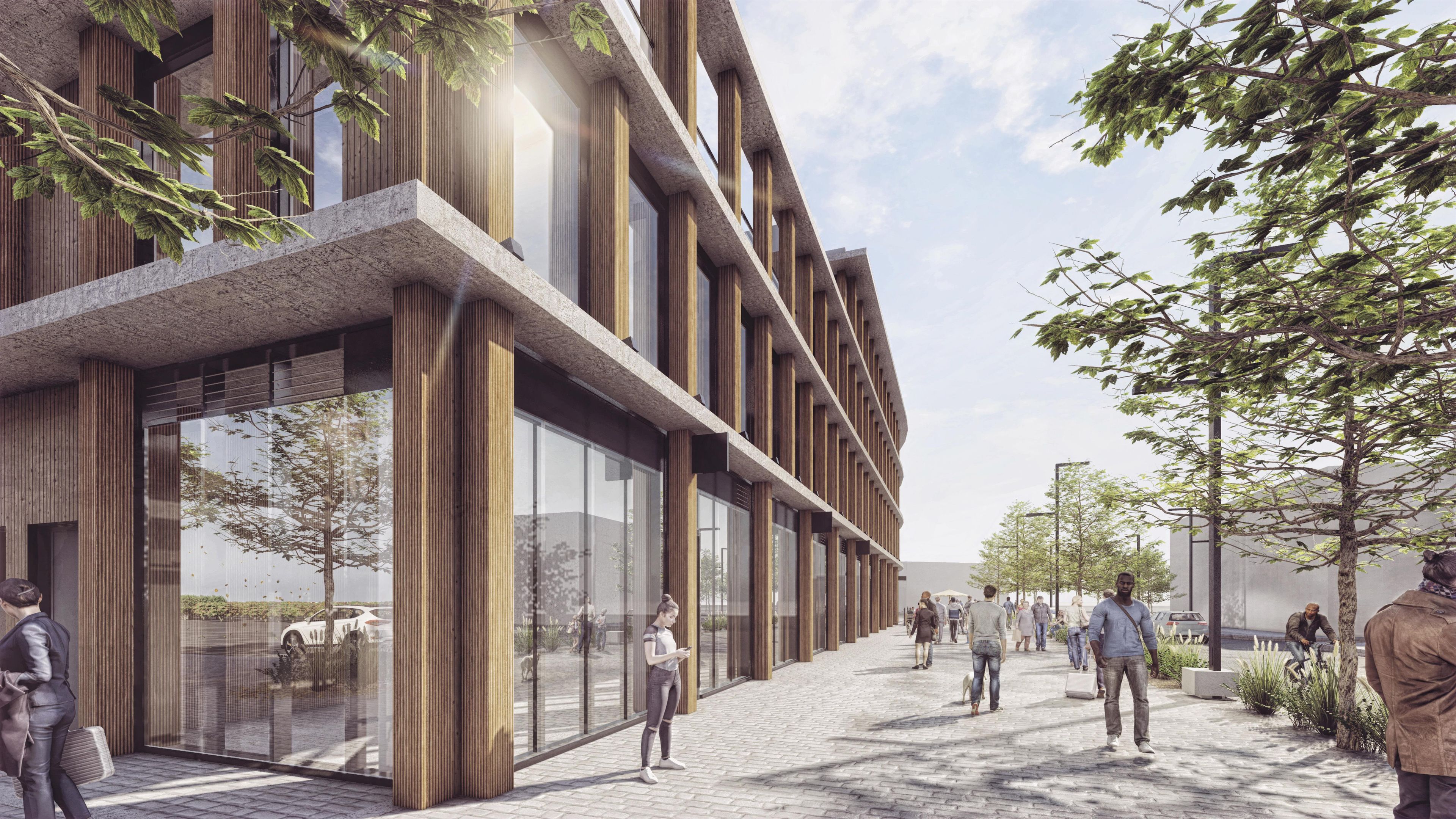 A modern building with a glass facade, wooden accents, and a paved walkway.