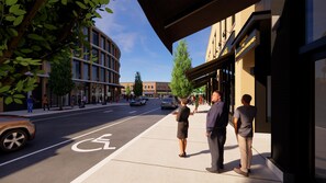 A modern building with a curved facade, large windows, and a clear sky. - The Clayfield, in the Unbound Collection by Hyatt (Niagara-on-the-Lake)