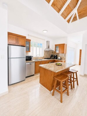 Coffee/tea maker, fridge, microwave, oven - Oceanfront Paradise | Cliffside Spa & Pool in SOV (Sosúa)
