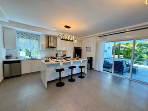 Fridge, microwave, oven, stovetop - Sunset Villa in Oceanfront Sosua Ocean Village (Sosúa)
