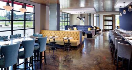 Steps to Mercedes-Benz Amphitheater + Rooftop Bar