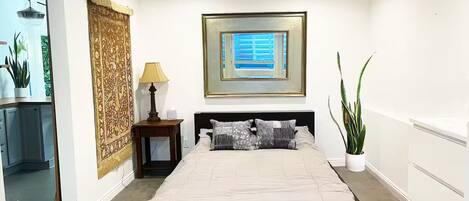 1 غرفة نوم ومكواة/لوح كي وخدمة الإنترنت وملاءات أسرّة