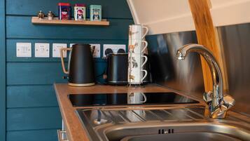 Microwave, stovetop, coffee/tea maker, toaster
