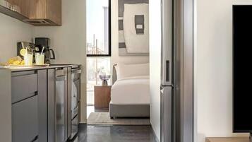 Superior appartement, uitzicht op de stad | Verduisterende gordijnen, een strijkplank/strijkijzer, gratis wifi