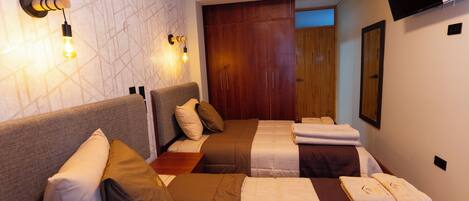 Basic Room | Desk, laptop workspace, blackout drapes, iron/ironing board