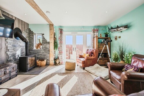 A Stunning Beachfront Retreat with Breathtaking Sea Views and Beach Access