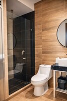 Premium Suite, City View | Bathroom | Shower, rainfall showerhead, hair dryer, towels