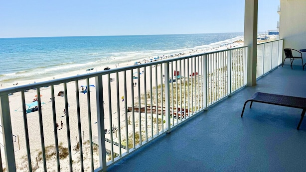 A balcony with a view of a beach and ocean. - 5 Star Beach Penthouse On Top Floor! Private Elevator & Extra Large Balcony (Gulf Shores)