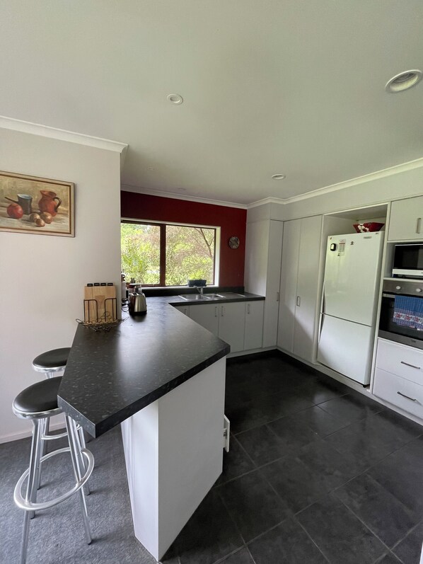 Fridge, microwave, oven, stovetop - Comfortable family home in charming Greytown (Greytown)