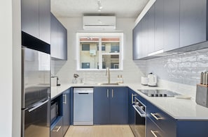 Fridge, oven, stovetop, dishwasher - Belle Escapes - Coral Drift Retreat (West Beach)