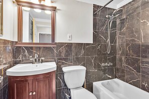 Hair dryer, towels, soap, toilet paper