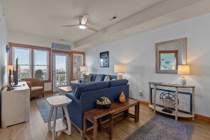 TV, books - C202 - OBX Dream: Cozy 2BR condo in Nags Head with soundfront views. (Nags Head)