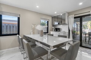 Dining - Sleek 4BR Beach House • Pool, Spa & Near Beach (Naples)