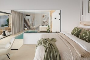 A modern bedroom with a large mirror, a bed with green and white bedding, a small bedside table, and a view of an outdoor area with a pool and seating. - Villa Amoreta wellness & spa (Istria - Županići) (Županići)