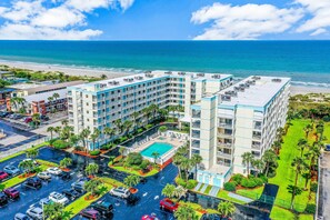 Exterior - Gorgeous Oceanfront 3BR Retreat - 2nd-Floor Balcony, Hot Tub, Pool, Tennis & Beach Gear! ☀️ (Cocoa Beach)