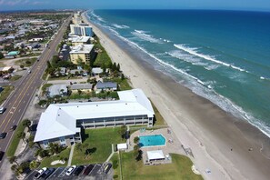 Exterior - Snowbird-Friendly Oceanside Condo — Heated Pool, Fire Pit & Beach Access! 🌴🌊 (Satellite Beach)