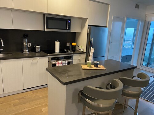 Sky High Views in Central Downtown!