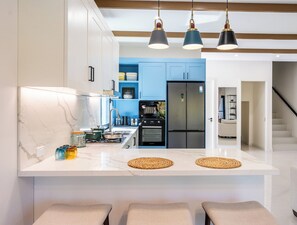 Deluxe Duplex, 3 Bedrooms, Kitchen, Pool View | Private kitchen | Full-size fridge, microwave, oven, stovetop - Tides Apartments (Nadi)