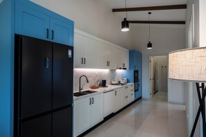 Deluxe Apartment, Balcony, Canal View | Private kitchen | Full-size fridge, microwave, oven, stovetop - Tides Apartments (Nadi)