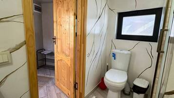 Shower, slippers, towels, soap