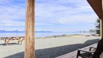 On the beach, sun loungers, beach towels
