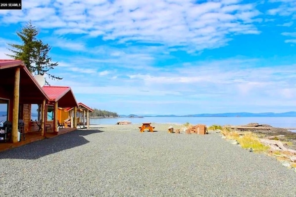 On the beach, sun loungers, beach towels