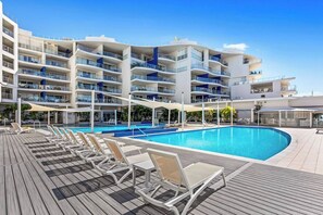 Outdoor pool, a heated pool - 3BR/3Bath Resort Apt • 2 Pools + Gym + 2 Car PK (Urangan)