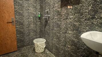 Combined shower/tub, hair dryer, towels, soap