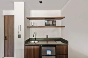 Fridge, microwave, stovetop, coffee/tea maker