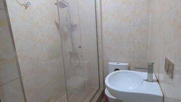 Shower, towels, soap, shampoo