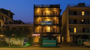 A multi-story hotel with a sign reading "Hotel Adminite Expressway." - Hotel Admire Expressway BY ASPL (Noida)