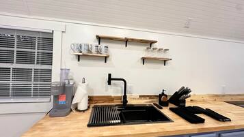 Fridge, microwave, stovetop, cookware/dishes/utensils