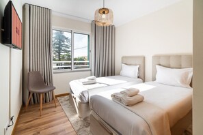 2 slaapkamers, een strijkplank/strijkijzer, internet, beddengoed