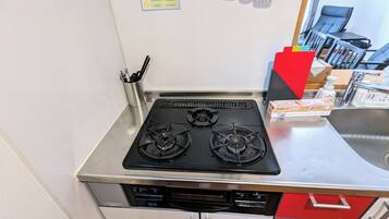 Fridge, microwave, cookware/dishes/utensils