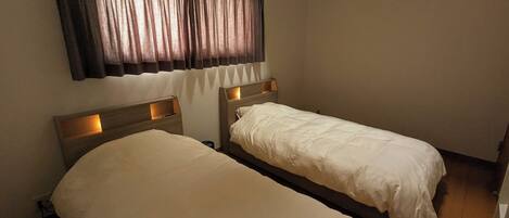 مكواة/لوح كي وواي فاي مجانًا وملاءات أسرّة