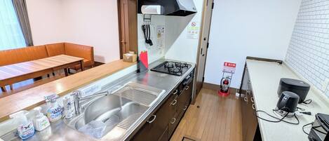 Fridge, microwave, cookware/dishes/utensils