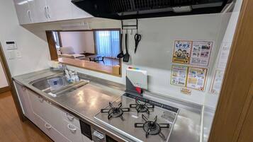 Fridge, microwave, cookware/dishes/utensils