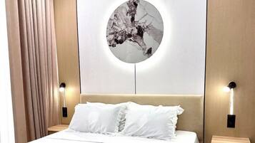 Apartament Comfort, diversos llits, vistes a la ciutat | Cortines opaques, planxa i posts de planxar i wifi gratuïta