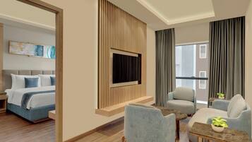 Suite, 1 Tempat Tidur King, pemandangan kota | Ruang keluarga