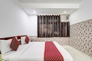 Pillowtop beds, desk, laptop workspace, free WiFi