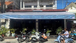 A building with a sign reading "The Deck." - The Deck Toul Tompoung (Phnom Penh)