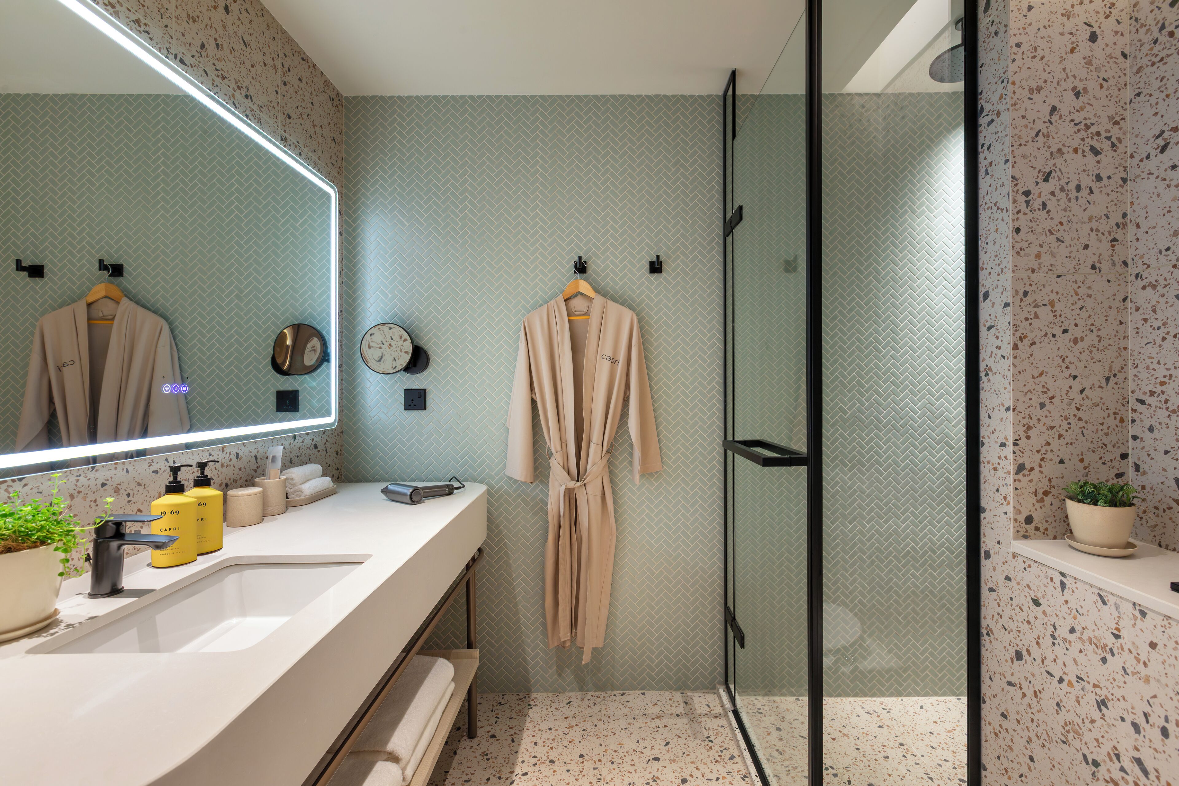 Hair dryer, bathrobes, towels, soap