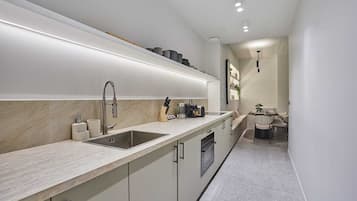 Fridge, microwave, stovetop, coffee/tea maker