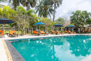 Outdoor pool, pool umbrellas, sun loungers