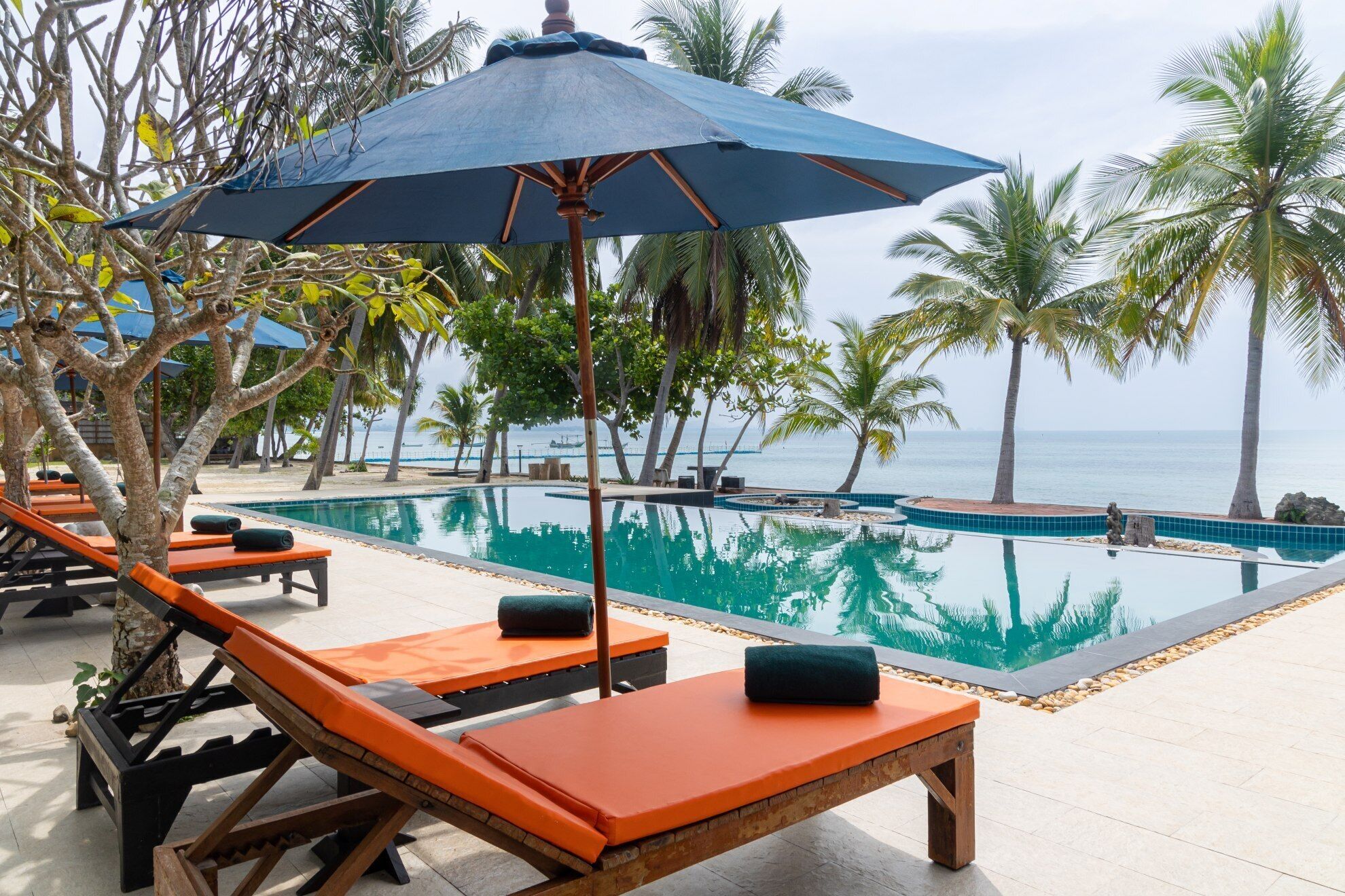 Outdoor pool, pool umbrellas, sun loungers