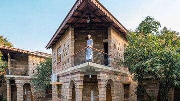 Deluxe Cottage, Garden View | Desk, laptop workspace, free WiFi