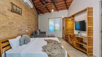 Deluxe Cottage, Garden View | Desk, laptop workspace, free WiFi