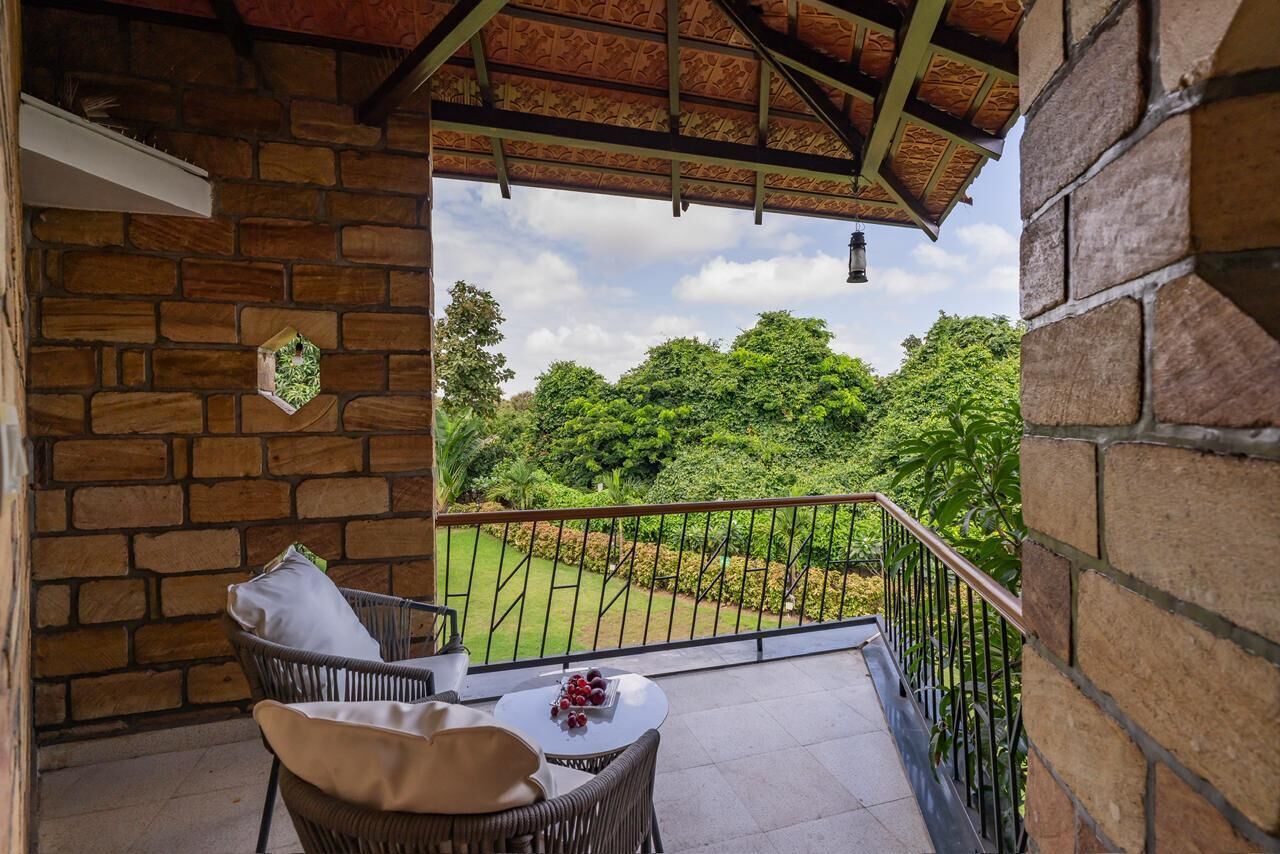 Deluxe Cottage, Garden View | Balcony view
