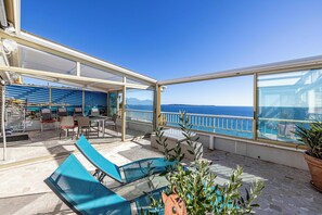 Apartamento | Restaurante al aire libre